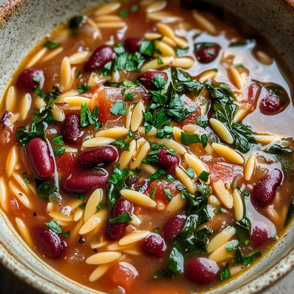Creamy One-Pot Mediterranean Orzo and Beans dish in a bowl