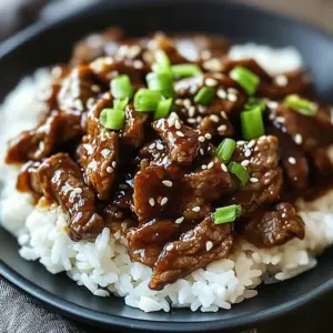 Delicious plate of irresistibly juicy Mongolian Beef with vegetables and sauce