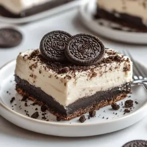 Delicious Oreo Lasagna dessert with layers of creamy filling and crushed cookies