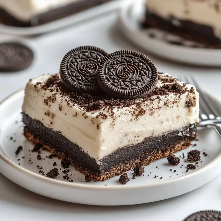 Delicious Oreo Lasagna dessert with layers of creamy filling and crushed cookies