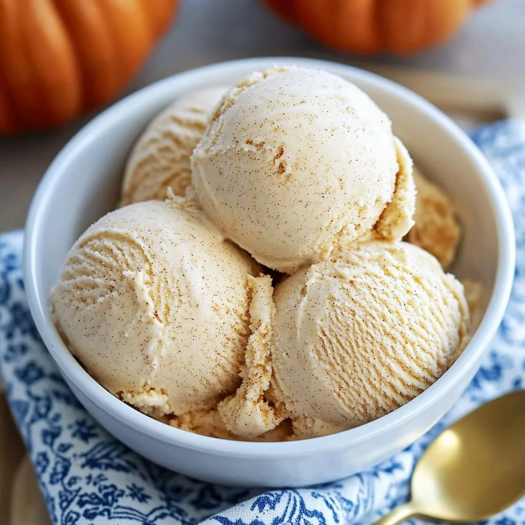 Delicious pumpkin dessert on a plate topped with whipped cream